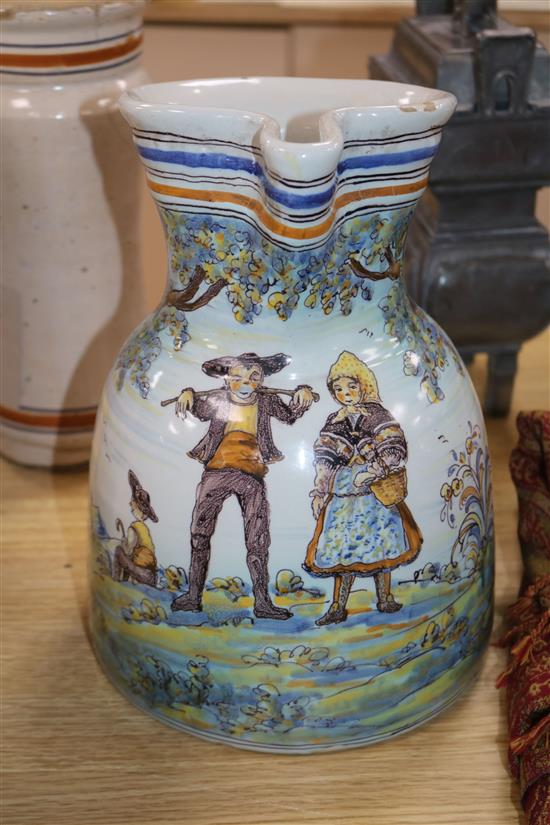 A pair of majolica albarelli, a faience jug and a footed bowl, tallest 27c,